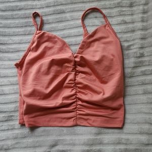 Pink colored scrunch crop top tank